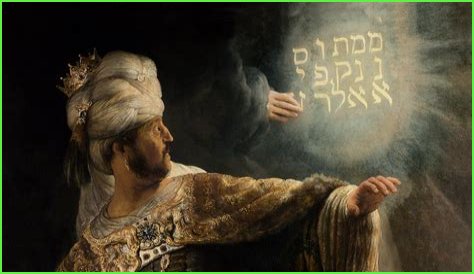 Which king saw the disembodied hand writing on the wall?